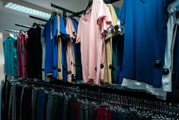 T-shirts and sweatpants in a clothing store.