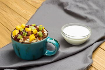 Muesli balanced protein breakfast. Fruits berries  seeds coconut yogurt.