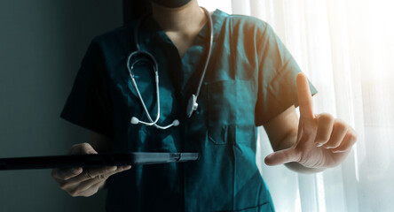 Doctor working with laptop computer in medical workspace office. doctor working on laptop computer in modern clinics office. search medical information. banner copy space