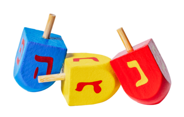 Wooden dreidels for Hanukkah isolated on white or transparent background.