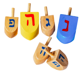 Wooden dreidels for Hanukkah isolated on white or transparent background.