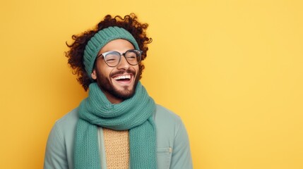 Happy man with scarf and knitted hat - obrazy, fototapety, plakaty