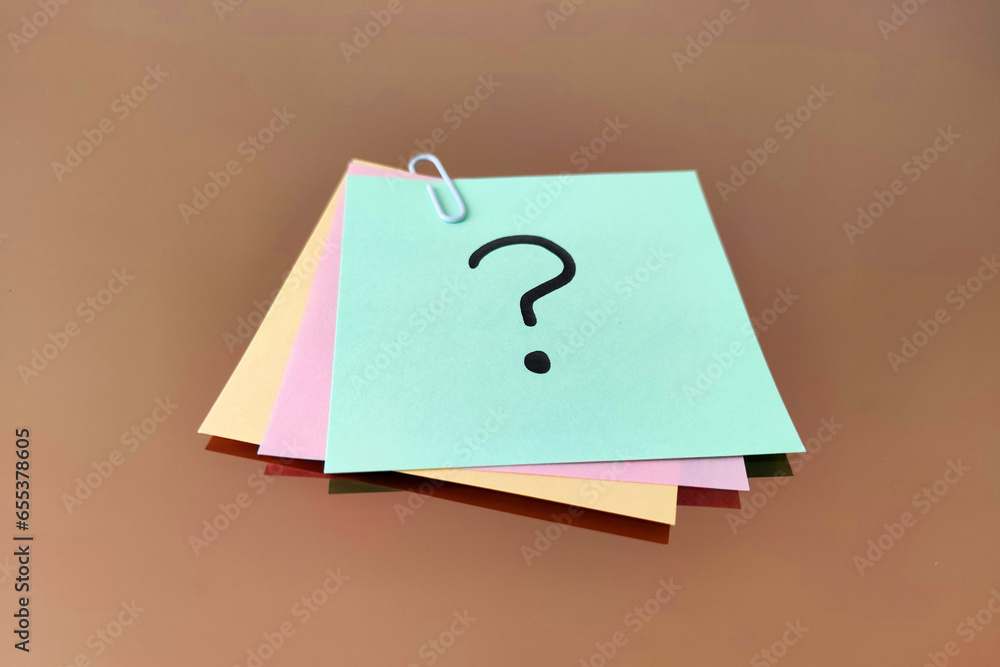 Poster multi colored note papers with question marks