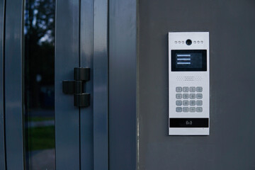 Video entrance doorbell in the entry of a modern house, technology and security concept. - obrazy, fototapety, plakaty