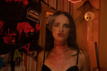 European Halloween party in a friends apartment- -Images of Young adults celebrating Halloween....