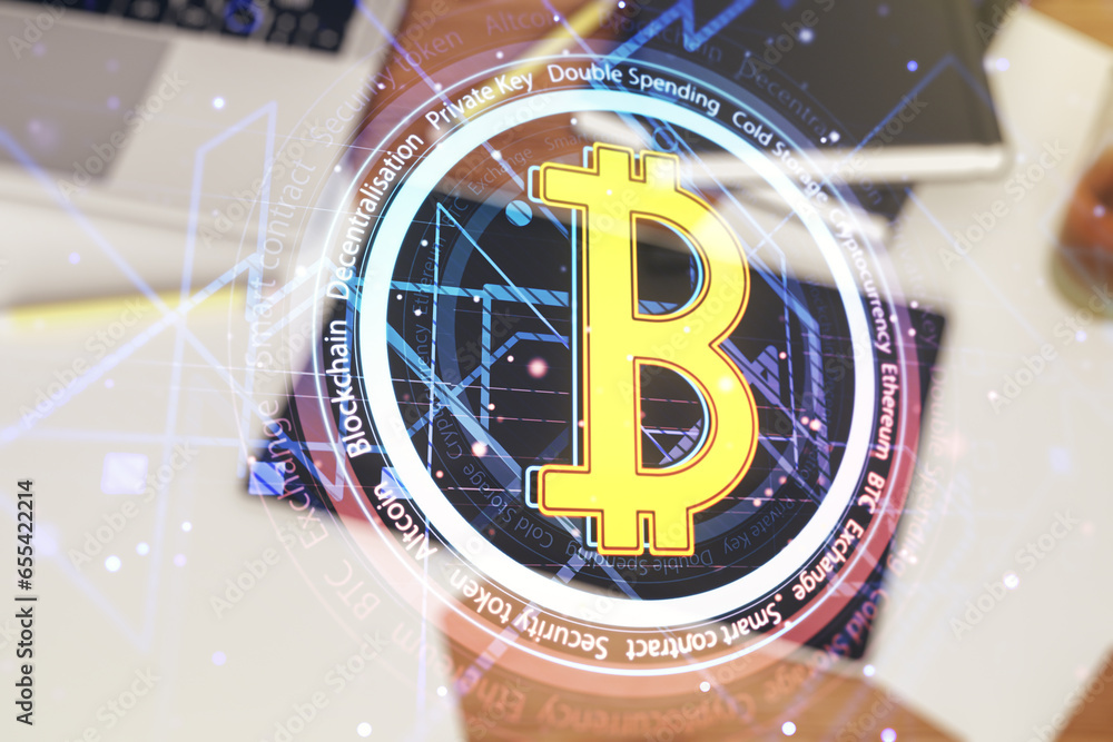 Poster creative bitcoin concept and modern digital tablet on desktop on background, top view. double exposu