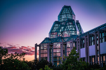 National Gallery of Canada with colourful blue hour sunset sky, Ottawa, Ontario, Canada. Photo taken from Sussex Drive in August 2022.