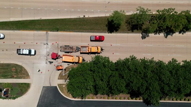Road work construction and lane closure near neighborhood, drone aerial footage