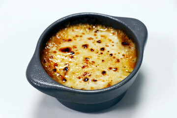 beef cottage pie in a remakin isolated in white background