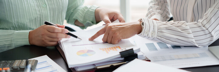 Financial inspector calculating a numbers in office room..