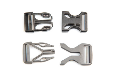 Fastex plastic clip for backpacks, bags, nylon belts on a white background. items and accessories for clothing and fixing tourist equipment