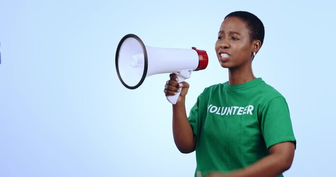 Woman, volunteer voice and megaphone for protest, support and call to action or join us in studio. African person speaking, volunteering and freedom of speech for change or fight on a blue background