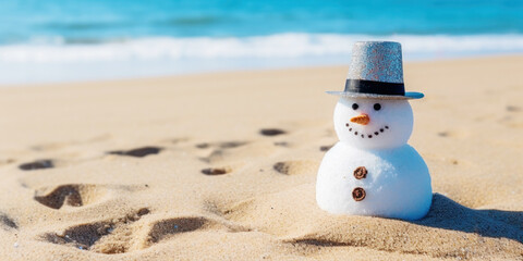 A cute Joyful  snowman on the beach in bright sunlight, with the sea or ocean in the background....