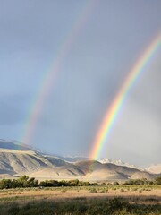 Double rainbow over Bishop, California plains and mountains