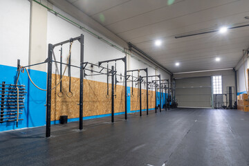 Cross training gym with bars and Olympic rings