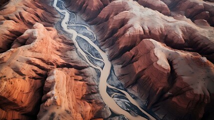 Aerial view of a red desert canyon carved by a gleaming silver river. vast and beautiful landscape of the great gorge. generative AI - obrazy, fototapety, plakaty