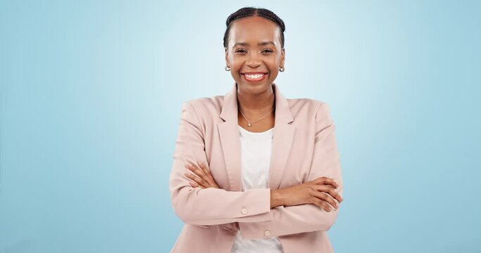 Black woman, business and arms crossed in portrait with smile, corporate career and confidence on blue background. Happy with job, mockup space and professional paralegal in studio with pride
