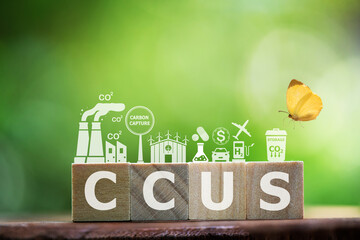 CCUS text on brown woods and icons. Capture, store and utilize carbon dioxide with Carbon Capture...
