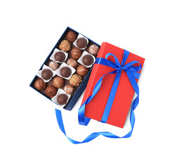 Box with delicious chocolate candies isolated on white, above view