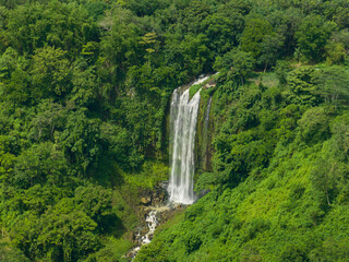Beautiful water streaming down from a mountain. Lasang Falls. Bukidnon. Mindanao, Philippines.