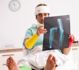 Young injured man staying in the hospital