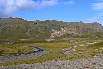 View of volcanoes and river valleys along Ring Road in eastern Iceland on sunny autumn morning.