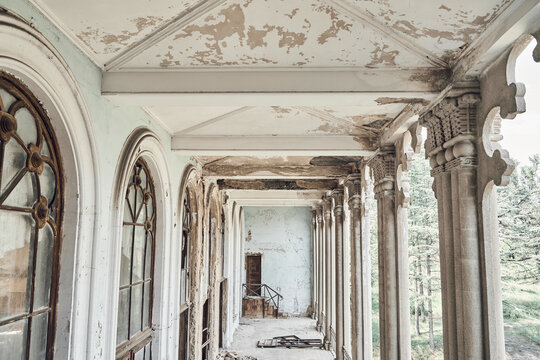 View of the gallery with arcade and columns. Abandoned soviet spa resort (sanatorium) Shakhter (Miner), in Tskaltubo, Georgia.