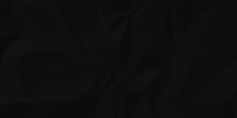 Dark crumple black paper wrinkled poster template ,blank glued creased paper texture background. black paper crumpled backdrop background. used for cardboard and clarkboard.