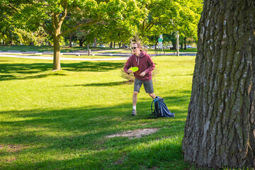 Disc golf is a flying disc sport in which players throw a disc at a target; played using rules like...