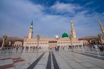 The famous green and silver domes of the Prophet's Mosque (Masjid Nabawi). The mosque was founded...