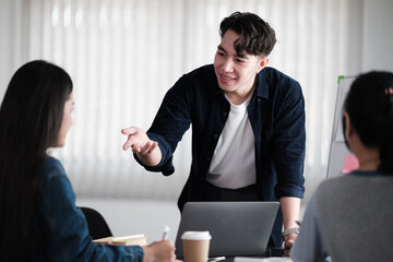 Team of young Asian entrepreneur have small team meeting for upcoming project for marketing and sale management for business startup and education