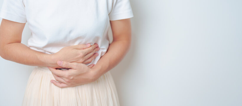 Woman having abdomen pain. Stomach, Ovarian and Cervical cancer, Cervix disorder, Endometriosis, Hysterectomy, Uterine fibroids, Reproductive, menstruation, diarrhea, digestive system and Pregnancy