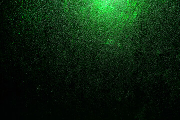 Black dark green shiny glitter abstract background with space. Twinkling glow stars effect. Like...
