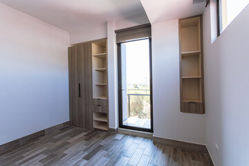 interior of luxurious apartment, view of wall closet without clothes