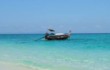 Fishing boat resting at sea on quiet tourist island