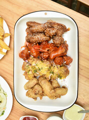 Chicken wings with BBQ sauce, broaster, buffalo, traditional Peruvian spice