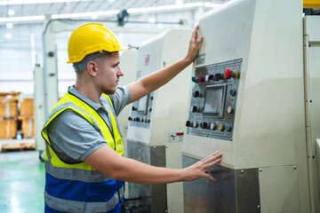 professional technician engineer with safety helmet hard hat working in industrial manufacturing factory, men at work to checking equipment of machinery production technology or construction operating