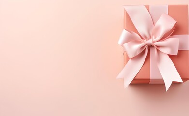 Pink bow gift box on isolated pastel background