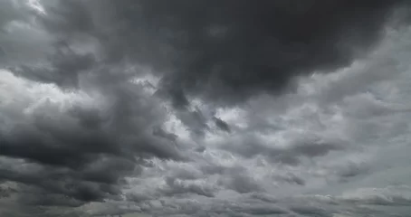Foto op Plexiglas anti-reflex  Dark sky with stormy clouds. Dramatic sky rain,Dark clouds before a thunder-storm. © pinglabel
