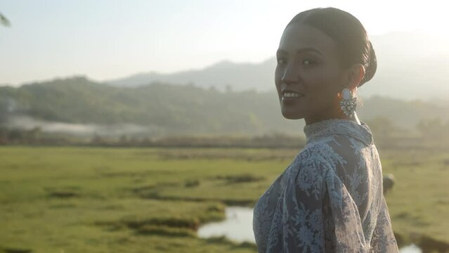 Woman In Lace Dress Smiles During Sunrise