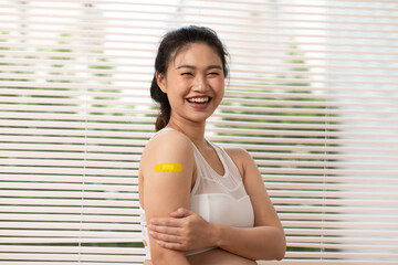 Happy Pregnant Asian Woman received anti virus vaccine cheerful with bandage,Pregnancy of young...