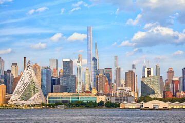 Midtown Manhattan skyscrapers over Hudson River, New York City - 655555095