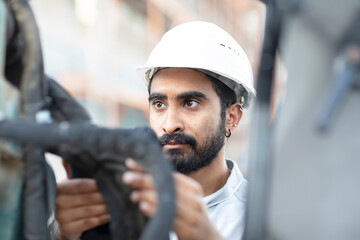 engineer with helmet working outside