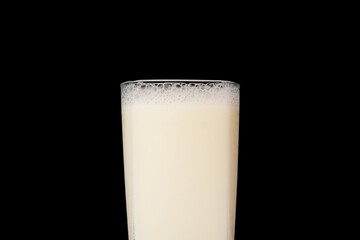 Close-up Fresh milk in glass isolated on black background.