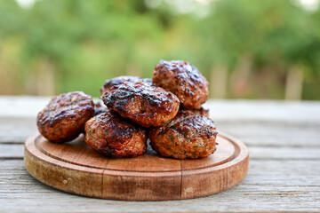 Home made Fried  pork meatballs  outdoor on wooden rustic background