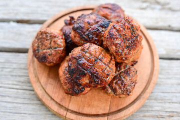 Home made Fried  pork meatballs  outdoor on wooden rustic background