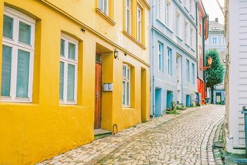 A beautiful and colourful cobblestone street in Bergen Old Town in Norway