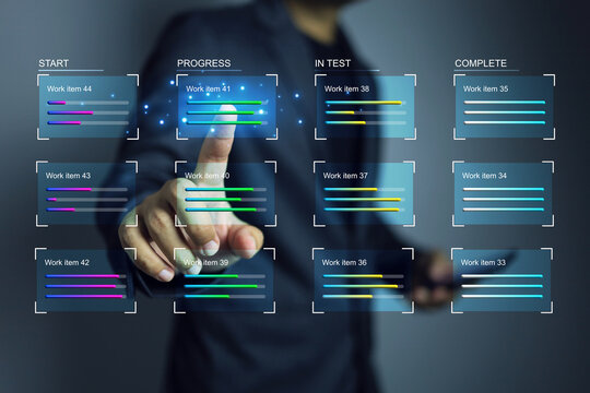 Data management concept. Business developer working on Kanban board framework agile software development document data base management. Business technology management