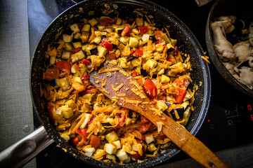 chef's culinary expertise on display, crafting a delectable ratatouille salad. Top view