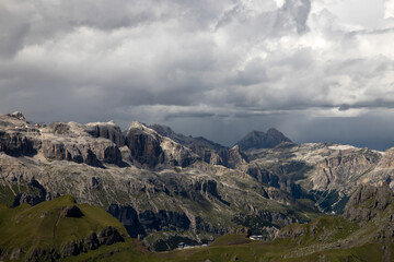 Fototapeta premium Panoramic view from the top of the Marmolada Glacier in summer mist, Dolomites, South Tyrol, Italy.